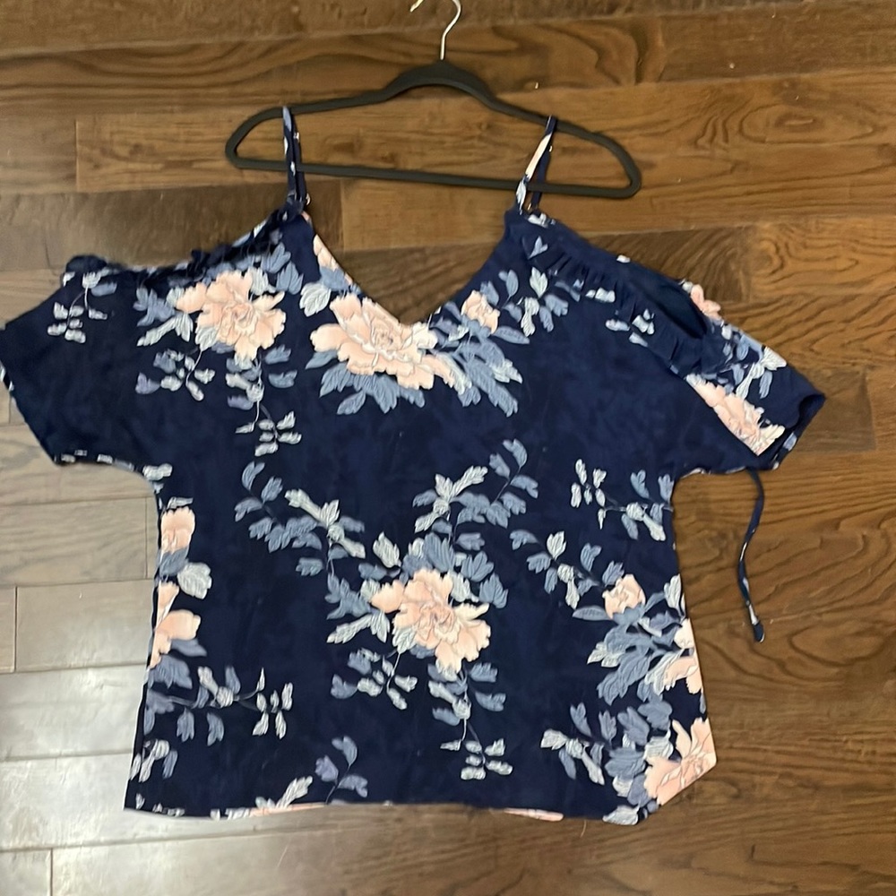 Women’s short sleeved exposed shoulder blouse , lined inside , flower pattern